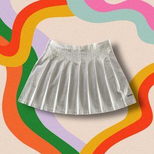 Urban Outfitters iets frans Pleated A-Line Tennis Mini Skirt
